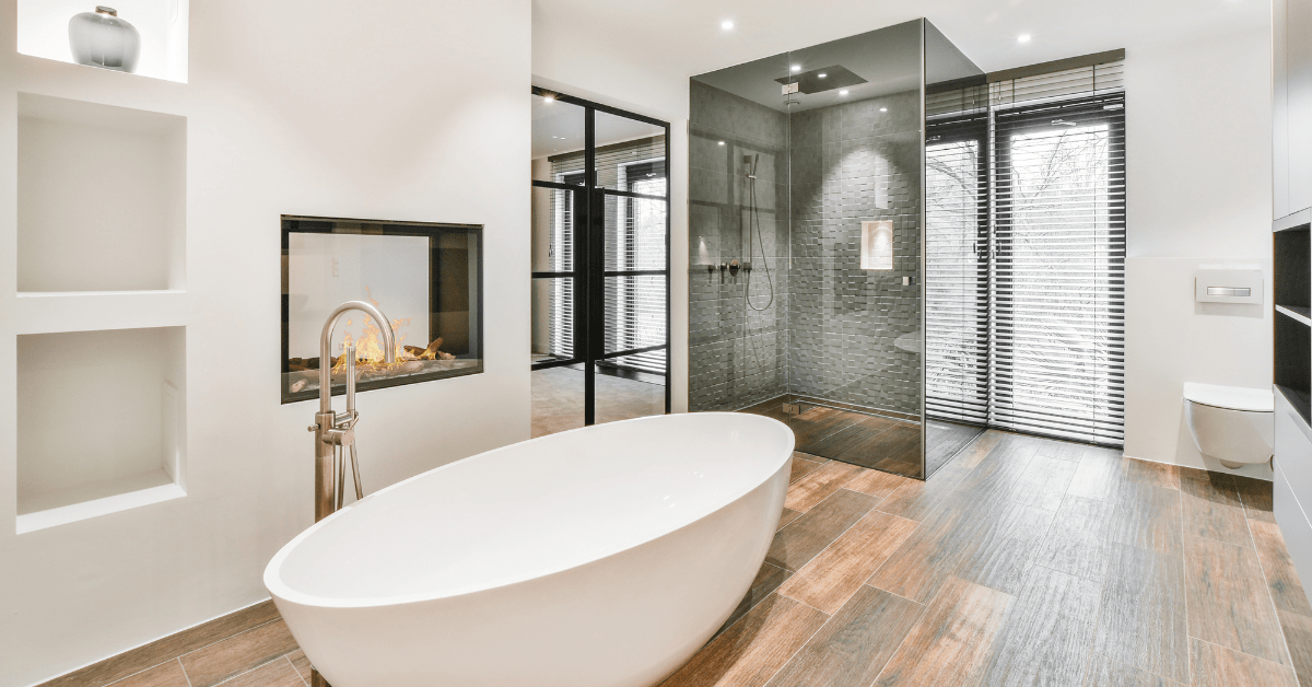 Large bathroom with a big white tub.