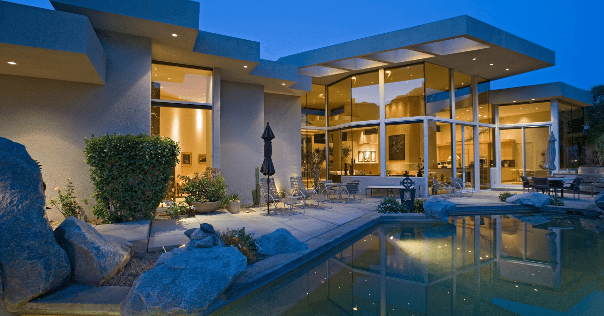 Contemporary exterior of a house at night.