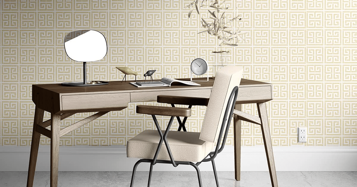 Metallic wallpaper flanking desk.