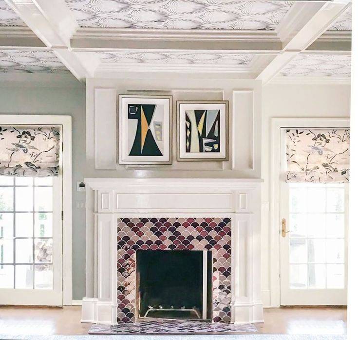 Bold colored fireplace tile.