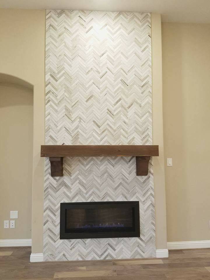 Grey and white fireplace tile.