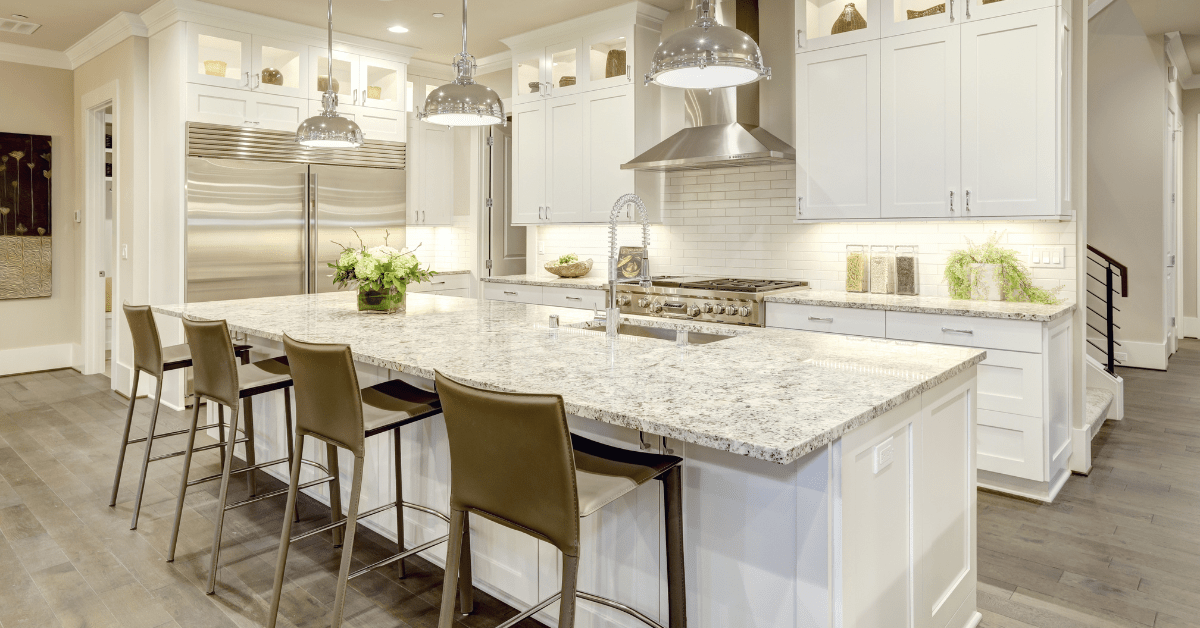 Large modern kitchen with white finishes.