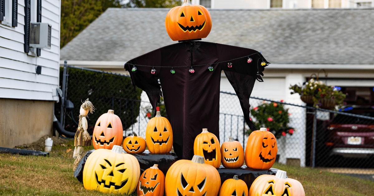 Curved pumpkins as Halloween decor for yard.