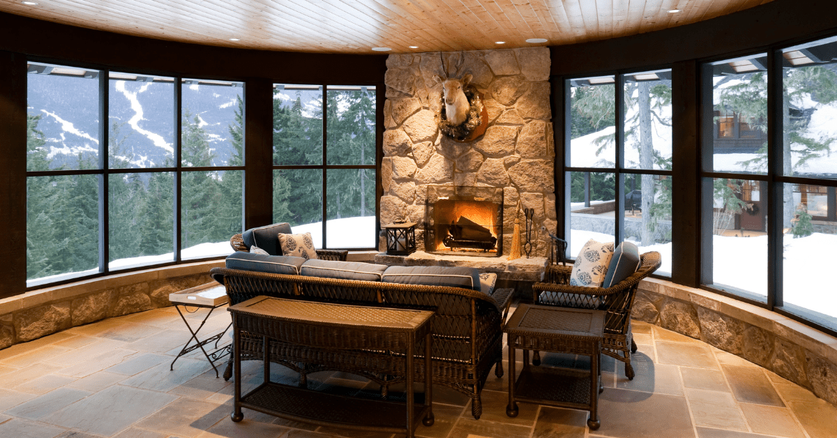 Modern stone fireplace in a room.