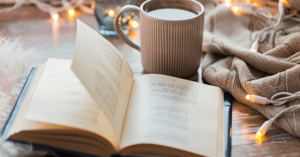 Book and coffee on coffee table.