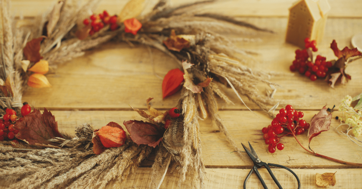 Rustic fall wreath on table.