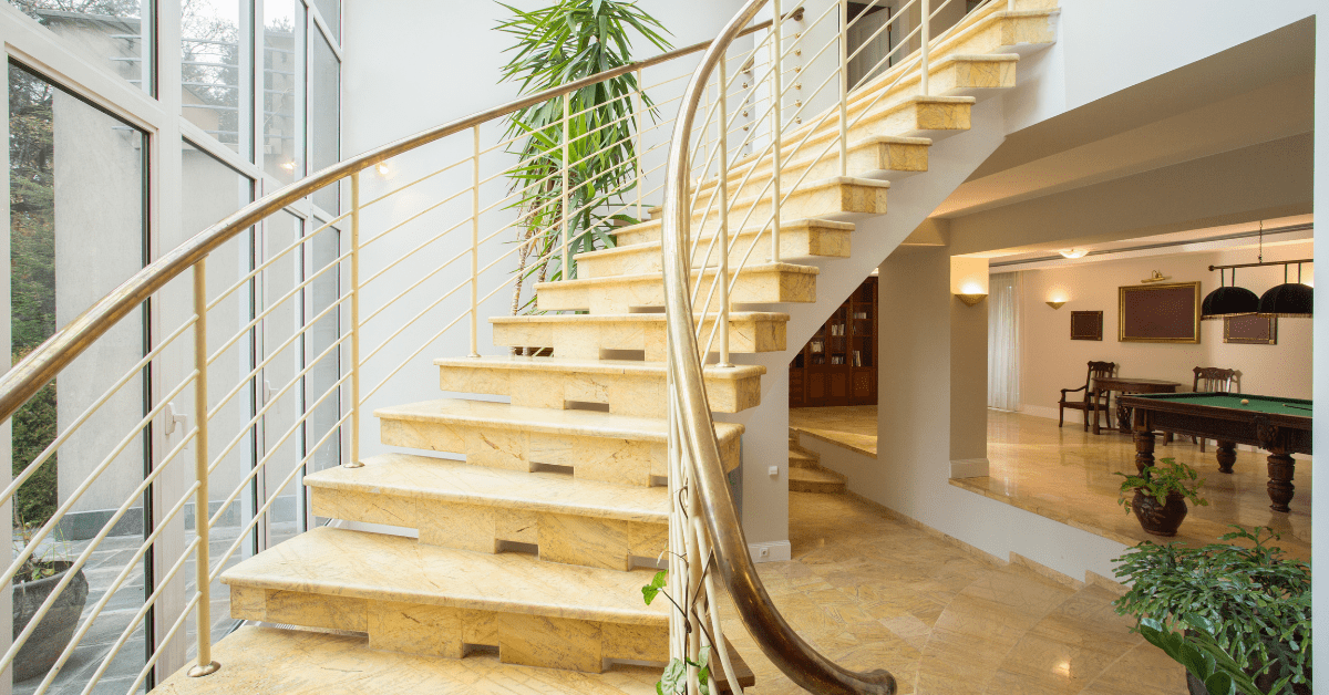 Greenery around stairs made of wood.