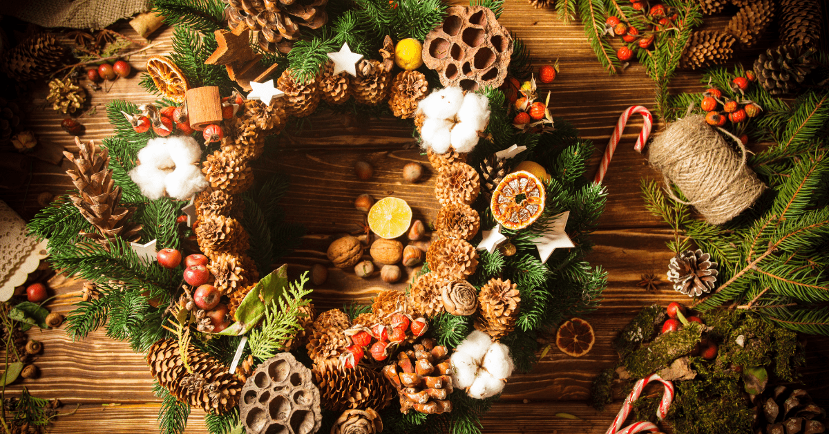 Busy fall wreath with lots of decorations.