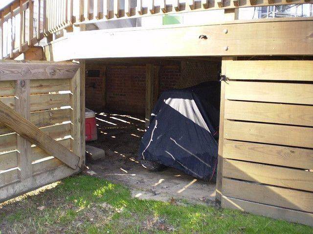 view of under porch storage