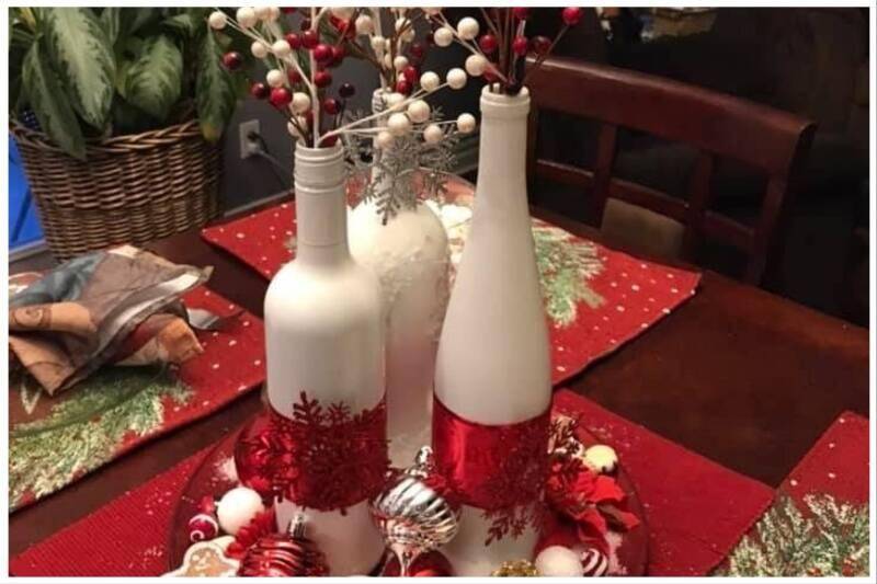 Painted wine bottles as Christmas centerpiece.