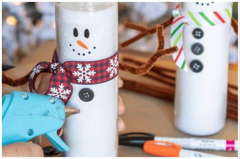 Snowman candles for Christmas centerpiece.