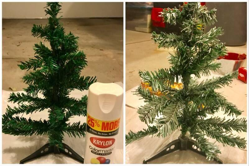 Spraying mini Christmas trees.