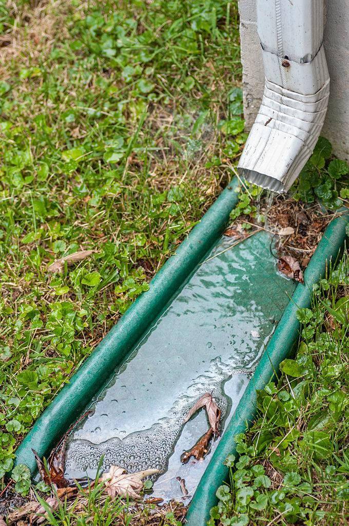 A pipe for carrying rainwater from a rain gutters called a downspout, waterspout, downpipe, drain spout, roof drain pipe, leader, or rone