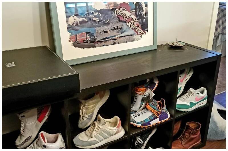 Shoe display in a cabinet.