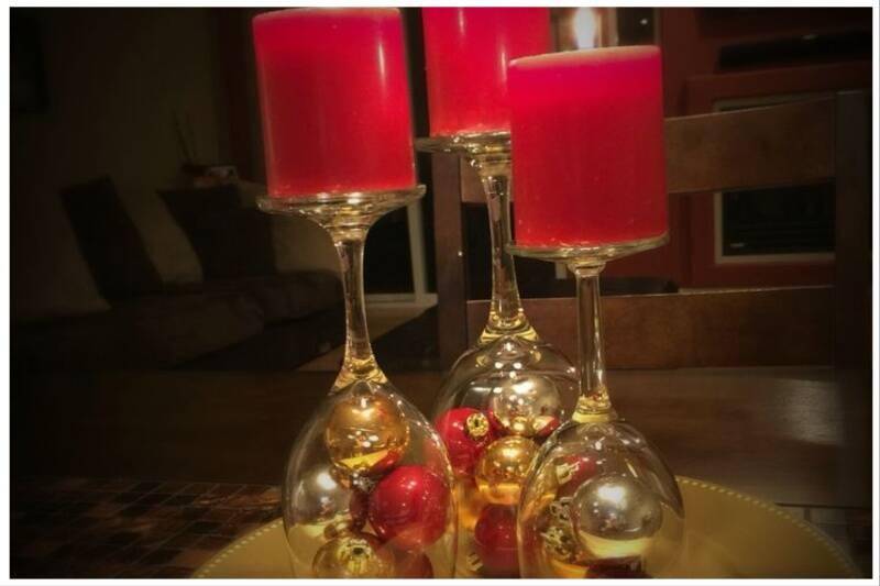 Wine glasses used as candle holders.