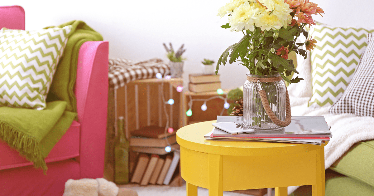 Colorful room decor in pink, yellow, and green.