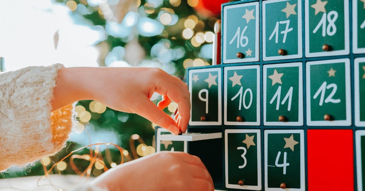 Person pulling one of the wooden box DIY advent calendar.