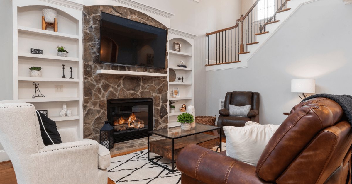 Stone fireplace in a living room.