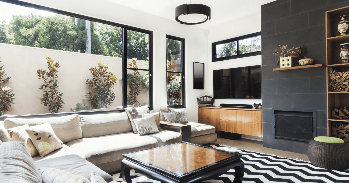 Modern living room with a wall-mounted TV.