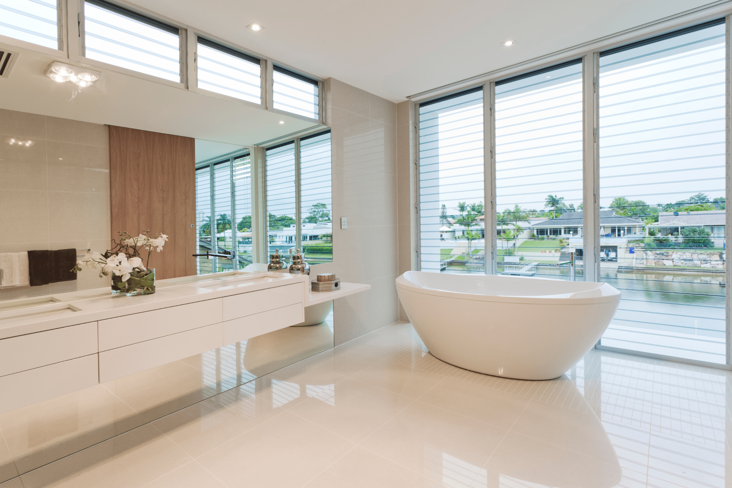 Luxurious bathroom with large white soaking tub.