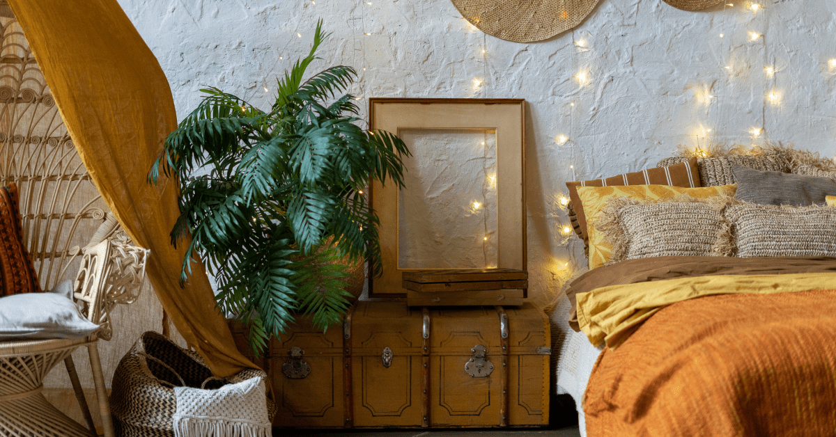 Bohemian-styled bedroom with hanging lights.