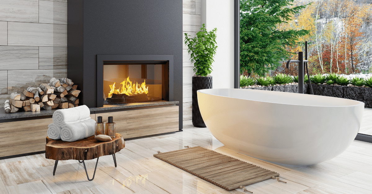 Black fireplace in a bathroom.