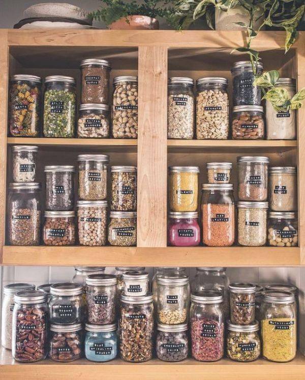 Jars organized in a pantery.