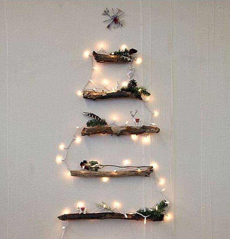 Floating shelves and Christmas lights in the shape of a tree.