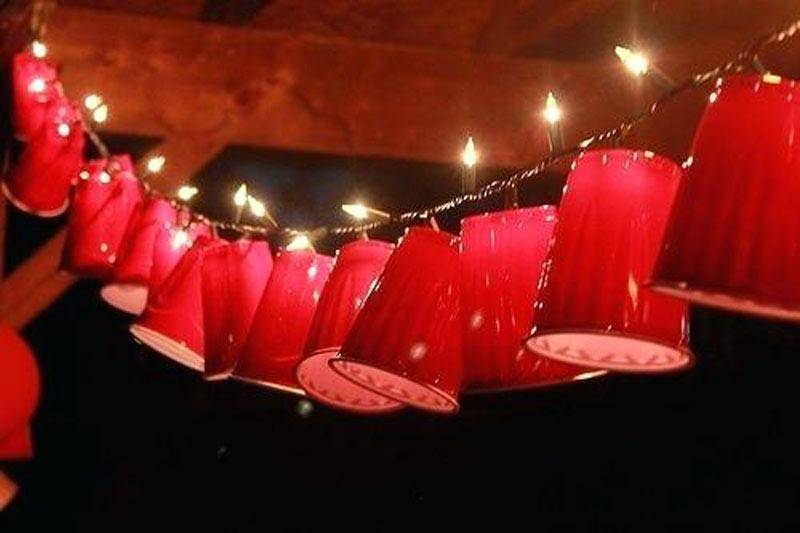 Red cups and lights on string.