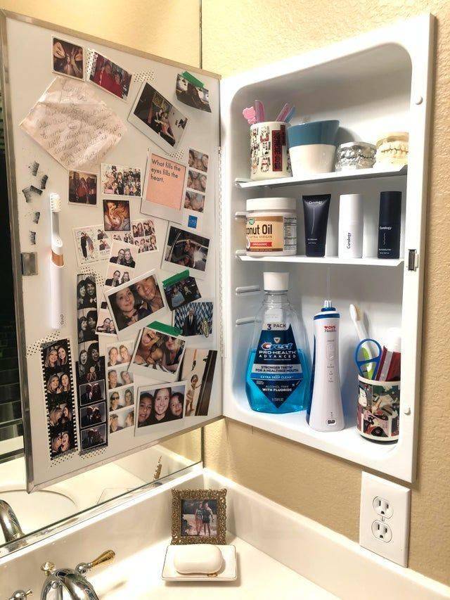 medicine cabinet decorated with photos