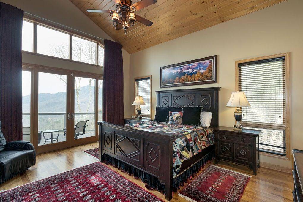 Traditional-styled bedroom with solid wood furniture.