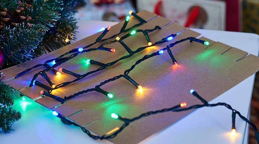 Wrapped Christmas string lights in multiple colors.