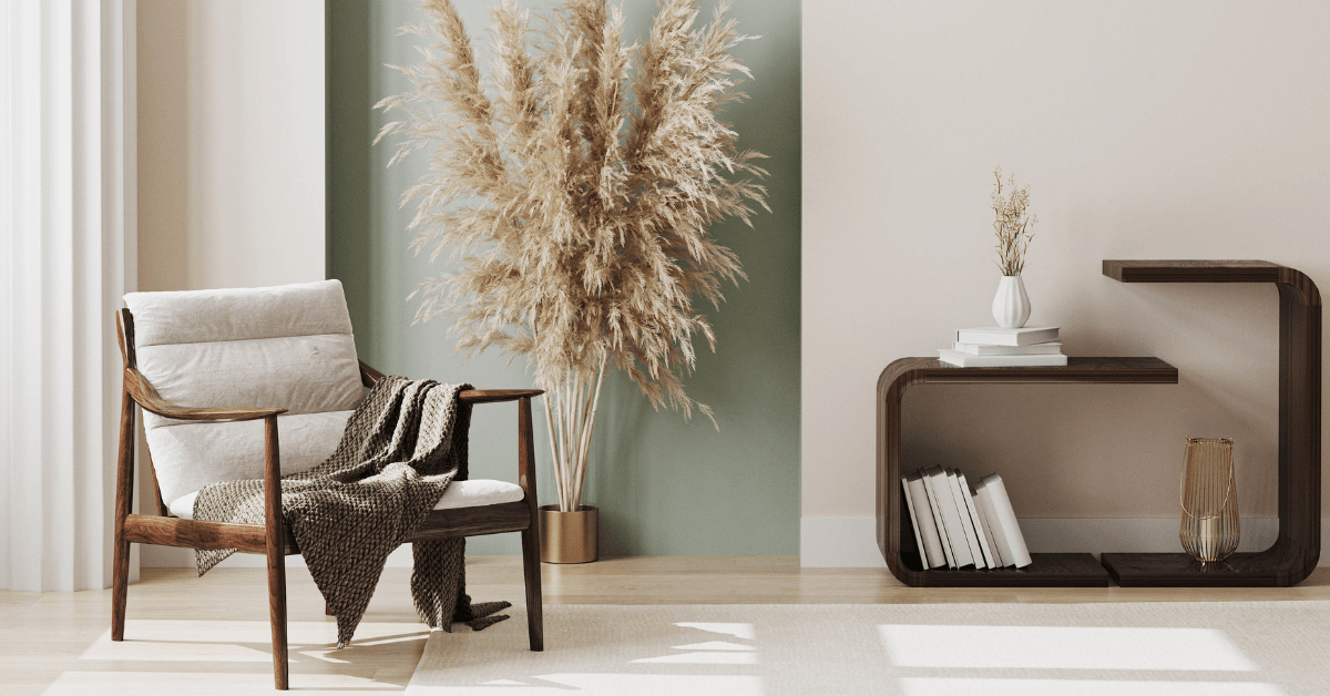 Cozy room with sage green accent wall.