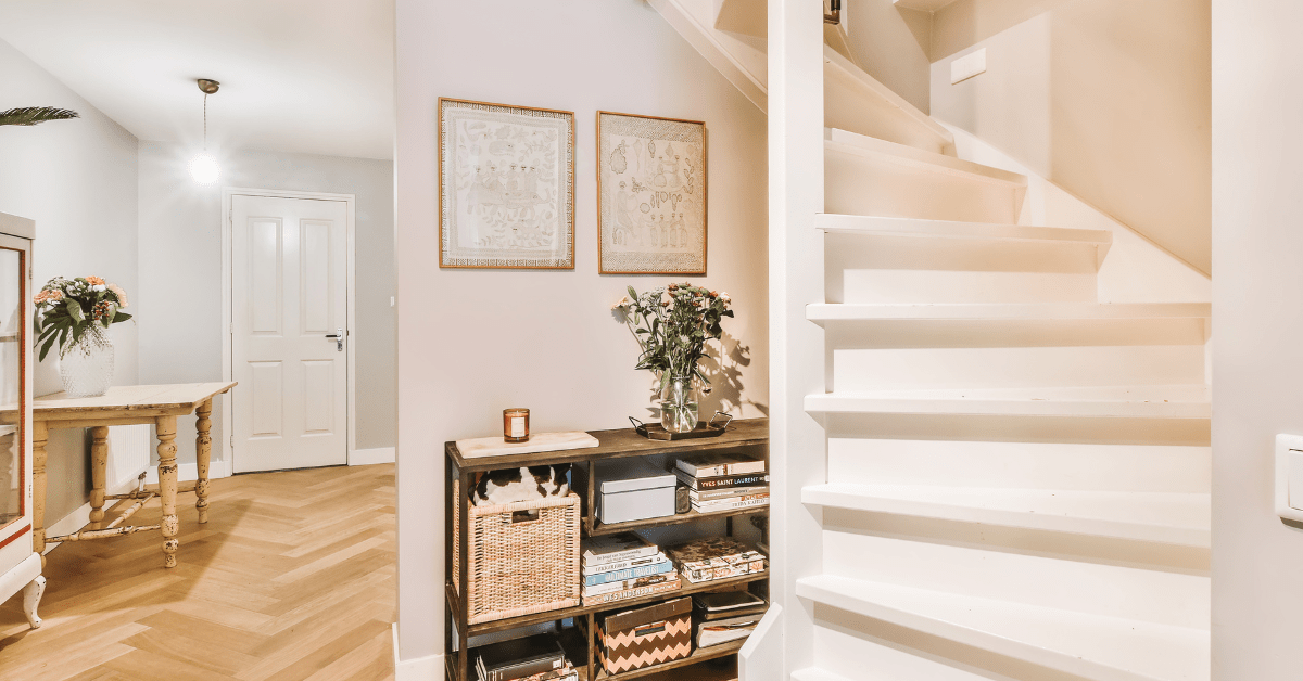 Art displayed in a staircase landing.