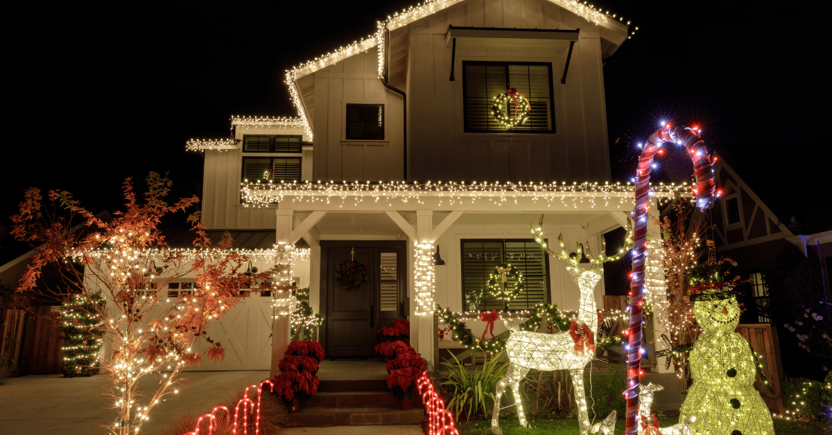 Christmas decorated house with many lights.