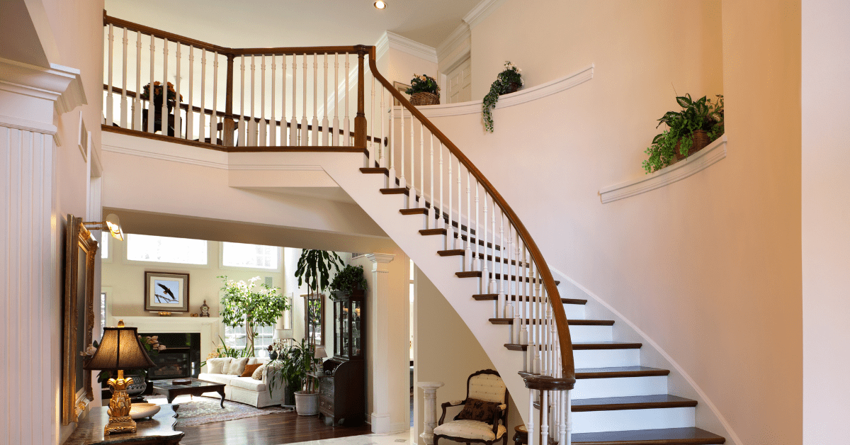 Greenery and plants hung in a staircase landing.