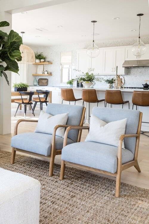 costal style living room with jute chairs and light blue accents