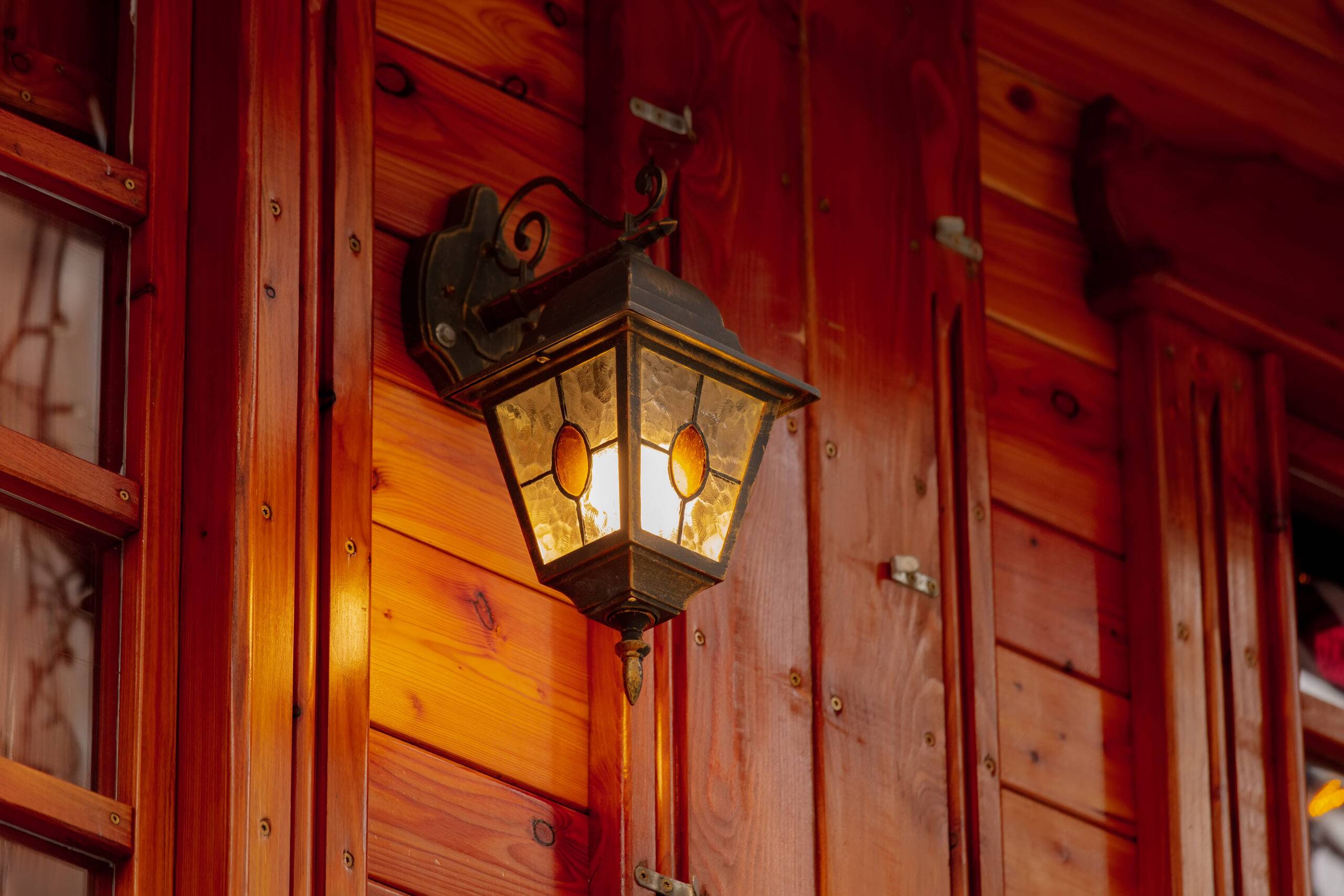 mounted light on wooden wall