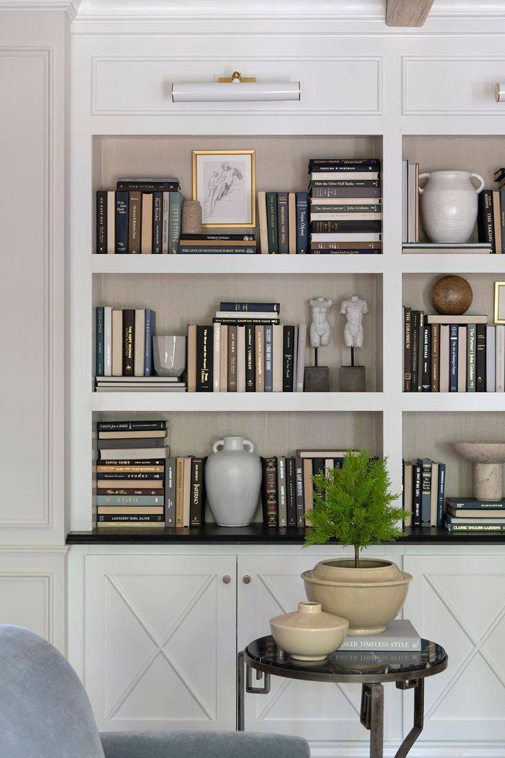 Nicely decorated bookshelves.