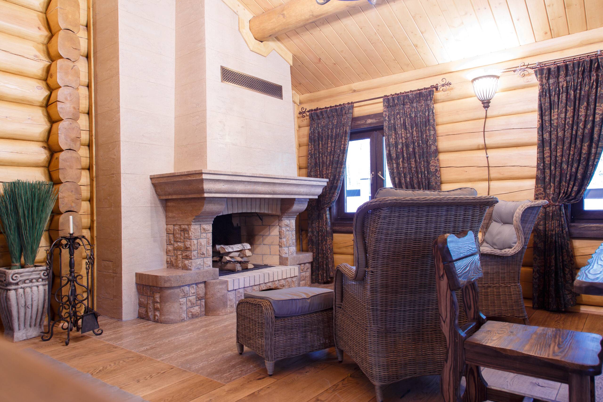 chimney room interior in private house built of logs