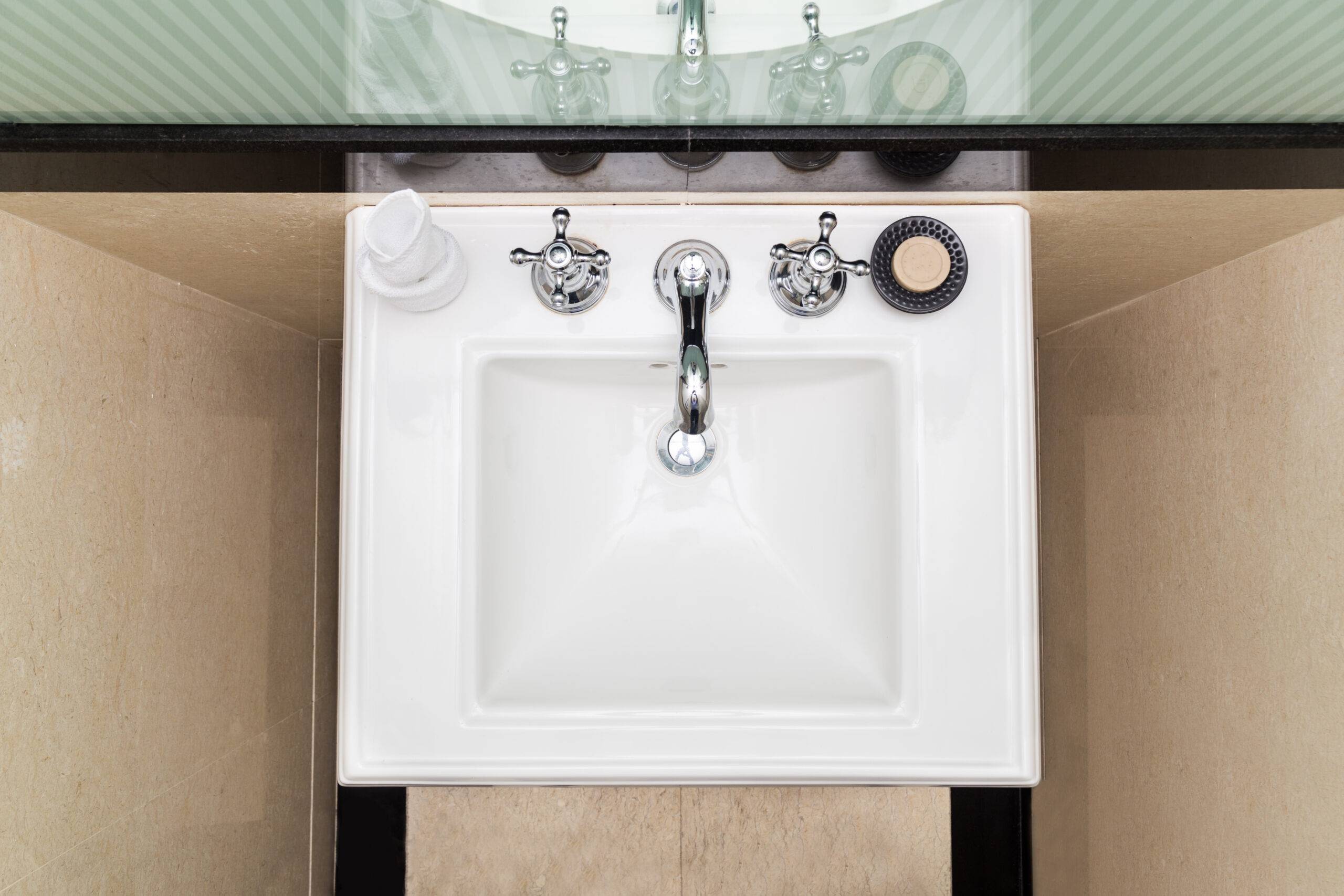 Contemporary and elegant wash basin sink in toilet bathroom