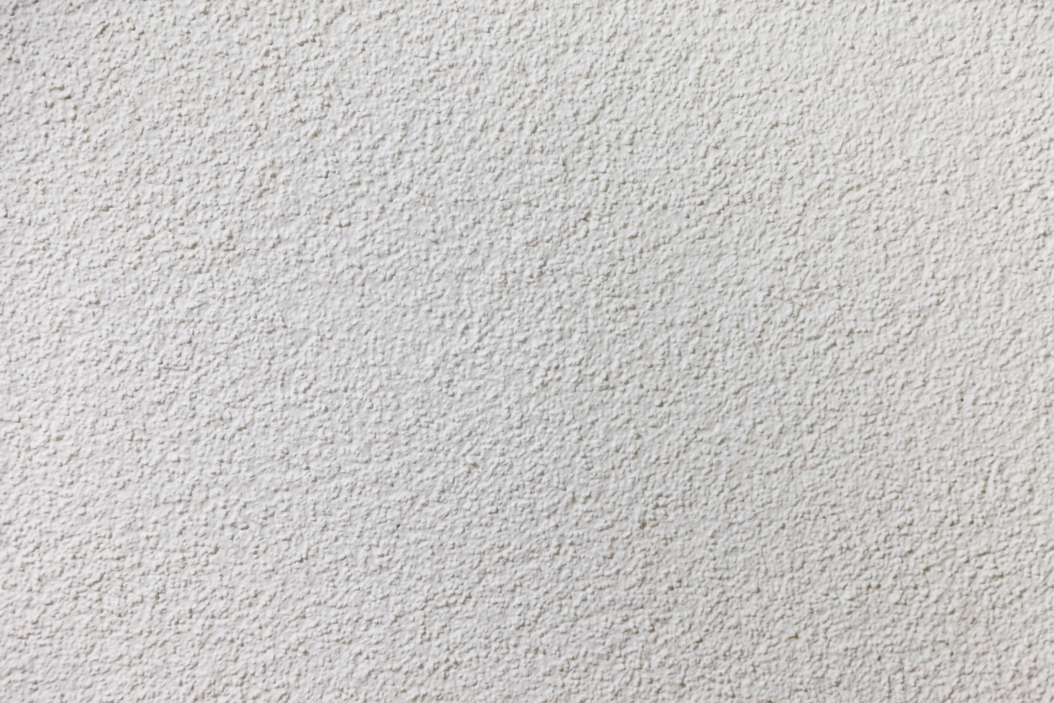 A closeup of a popcorn ceiling texture.