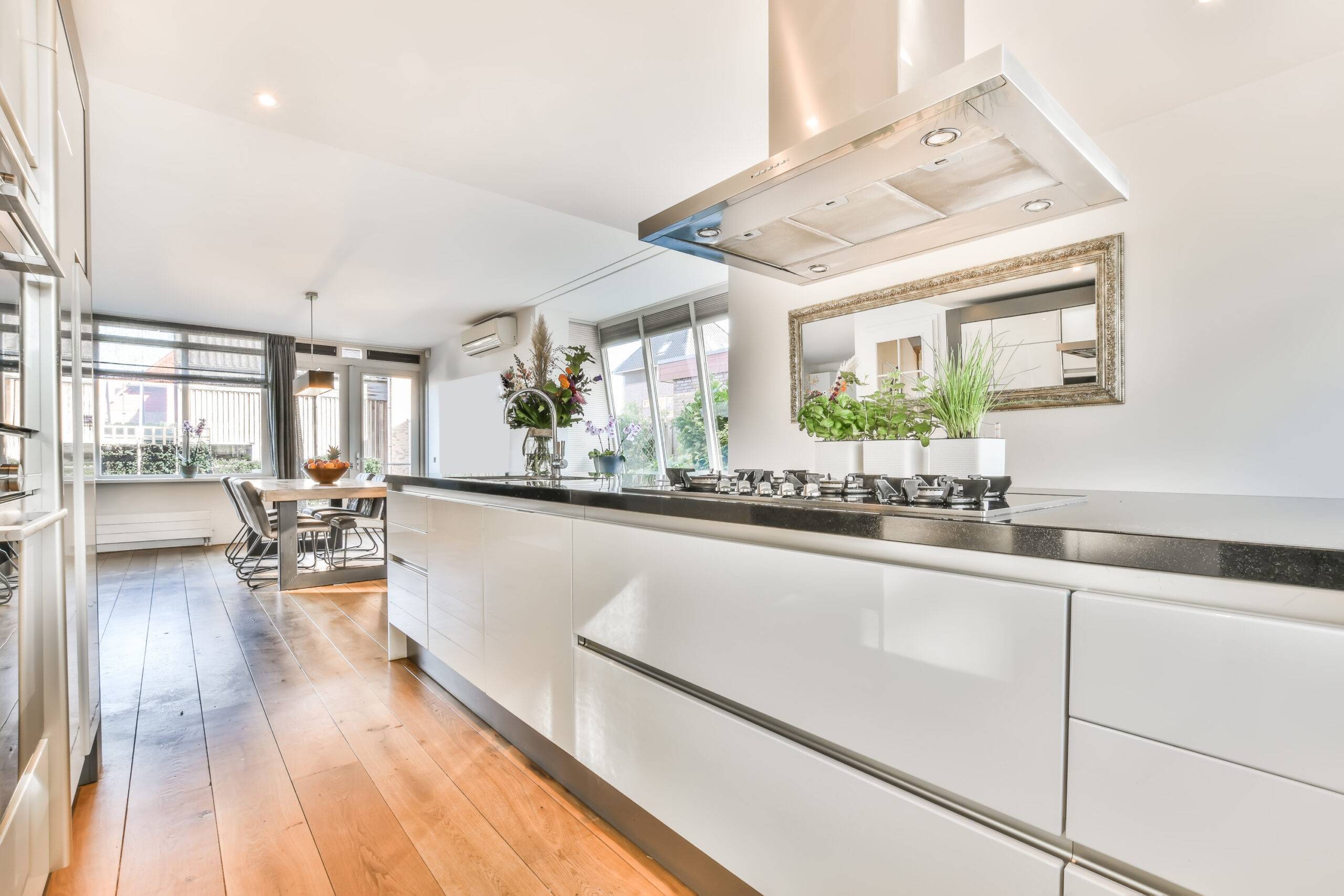 Corner kitchen with countertop located in contemporary flat