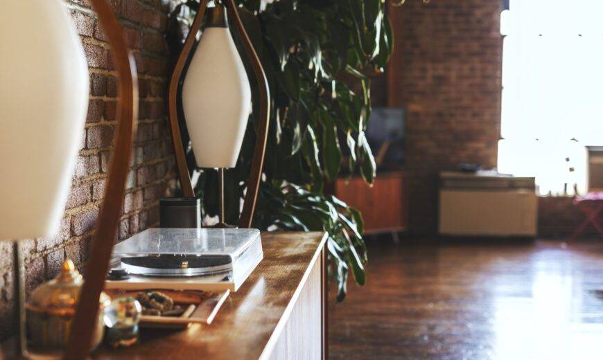 A mid-century modern sideboard with a record player.