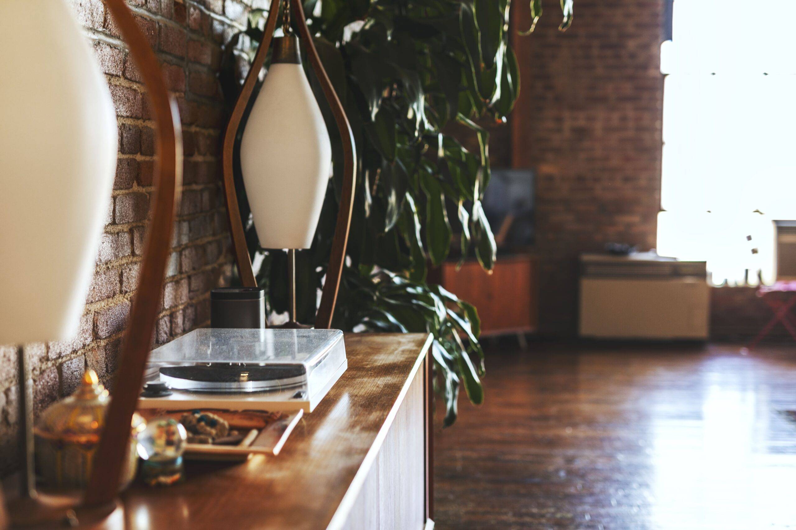 A mid-century modern sideboard with a record player.