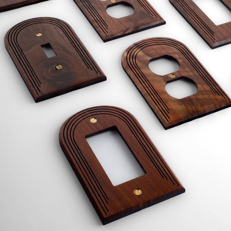 A selection of wood arched light switch covers.