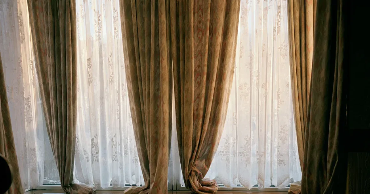 Curtains pooling at the floor