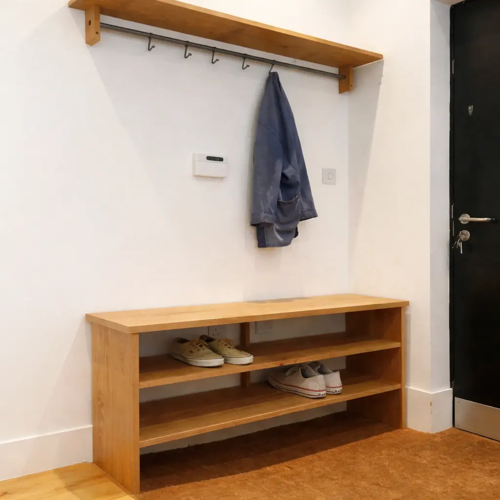 A house that practices the Japanese concept of Genken having a shoe rack