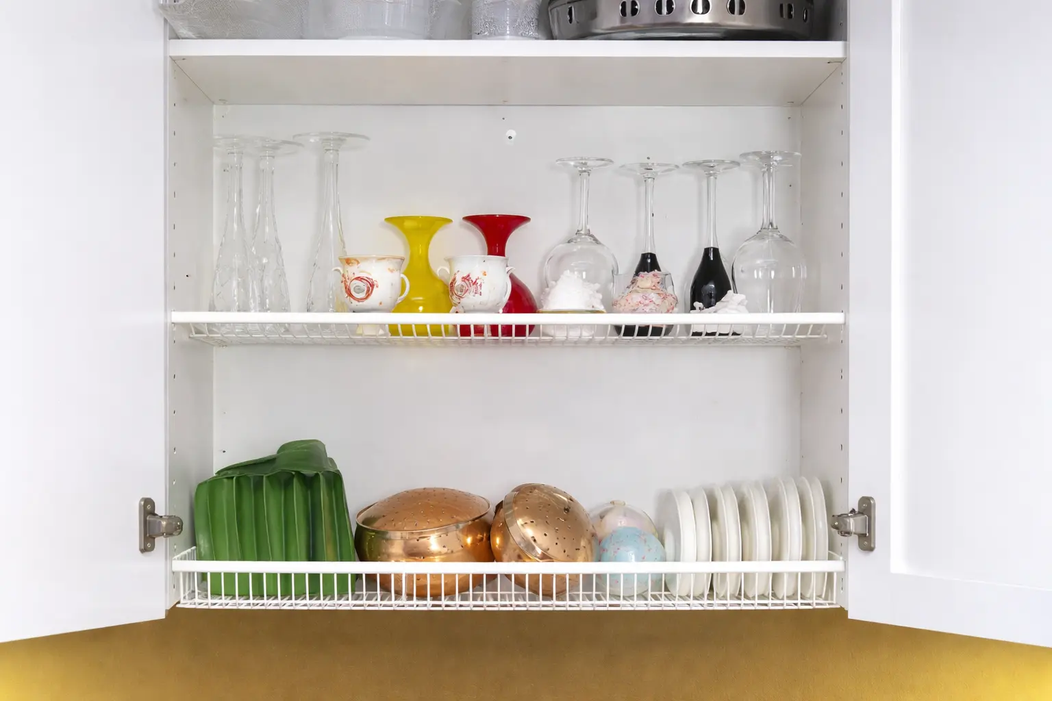 An image of a white Finnish dish drying rack "astiankuivauskaappi" with white open doors