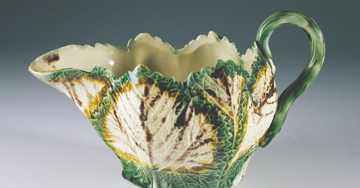 Ceramics - England - 18th century. Staffordshire ware. Sauce boat. Relief vegetal design.